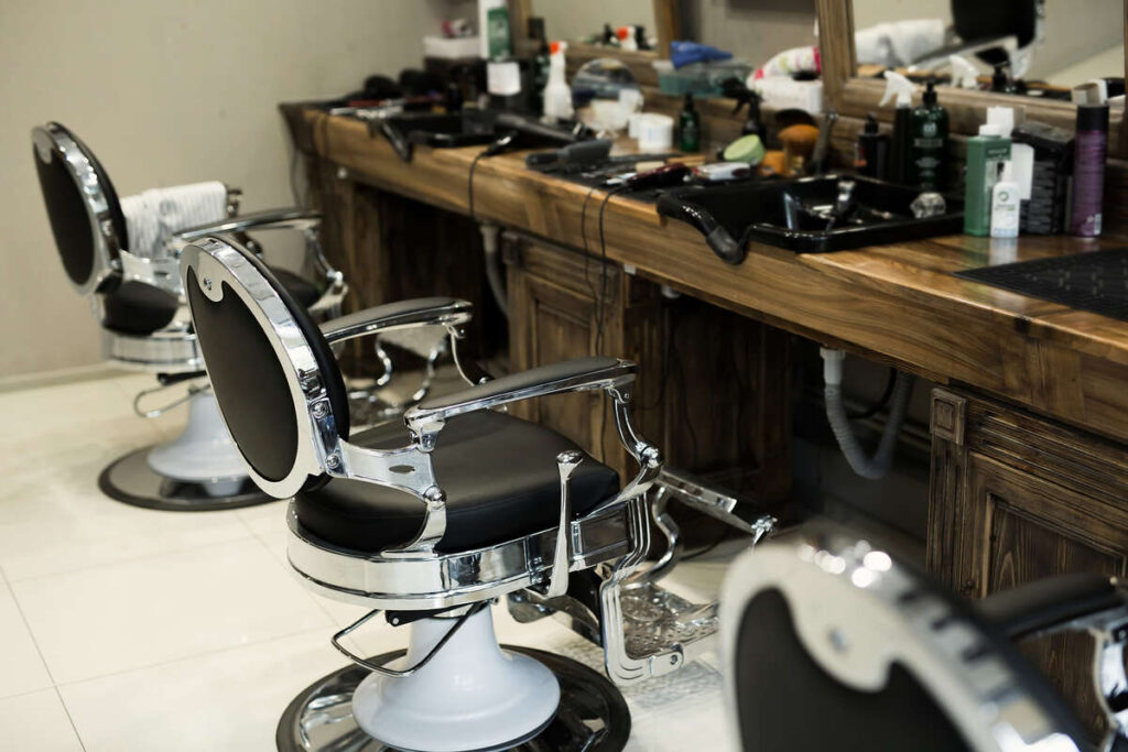 stylish-modern-barber-chairs-in-black-and-grey-bar-2022-02-15-17-26-10-utc (1)