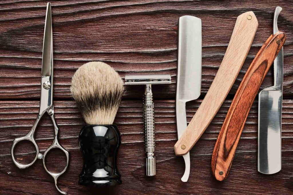 vintage-barber-shop-tools-on-wooden-background-2021-08-26-16-19-01-utc (1)