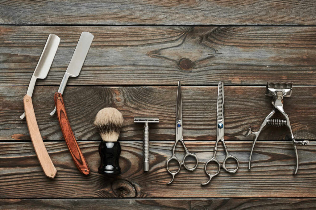 vintage-barber-shop-tools-on-wooden-background-2023-11-27-04-56-26-utc (1)